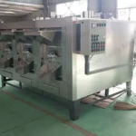 Machine à rôtir les noix de cajou à trois fours