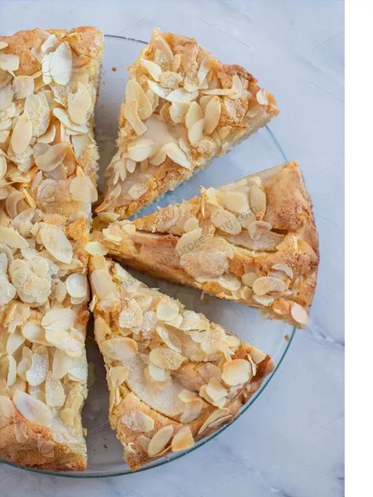 High-Efficiency Almond Slicing Machine For Perfect Nut Flakes 4 Sliced almond tart dessert with a golden crust and sweet topping
