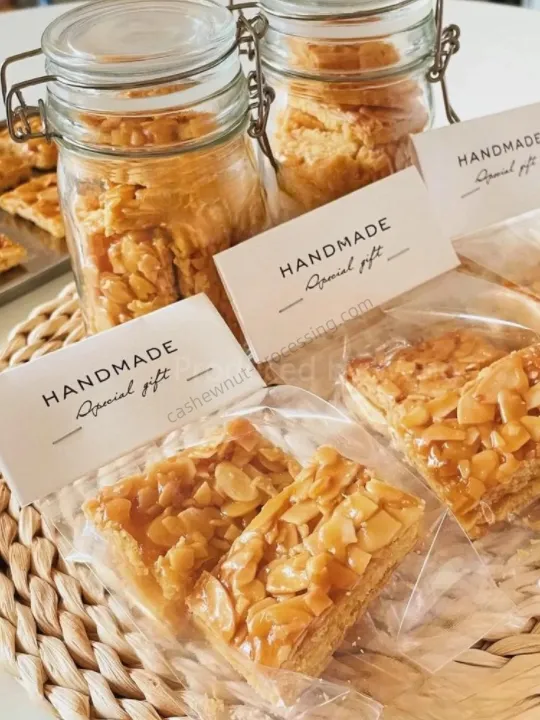High-Efficiency Almond Slicing Machine For Perfect Nut Flakes 6 Square crunchy almond slices pastries, homemade and packed as a sweet gift