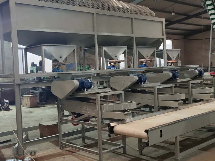 Almond shelling machine connected to weighing hopper in production line